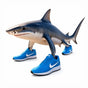 Tralalero Tralala character artwork, a shark walking on three legs in blue trainers