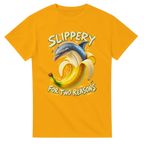 Gold t-shirt printed with Bananita Dolphinita and the words Slippery, for two reasons, front view