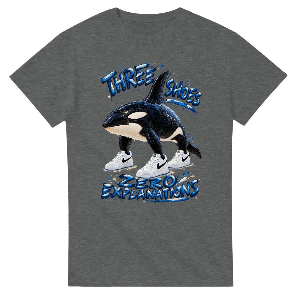 Graphite Heather t-shirt printed with Orcalero Orcala and the words Three shoes, zero explanations, front view