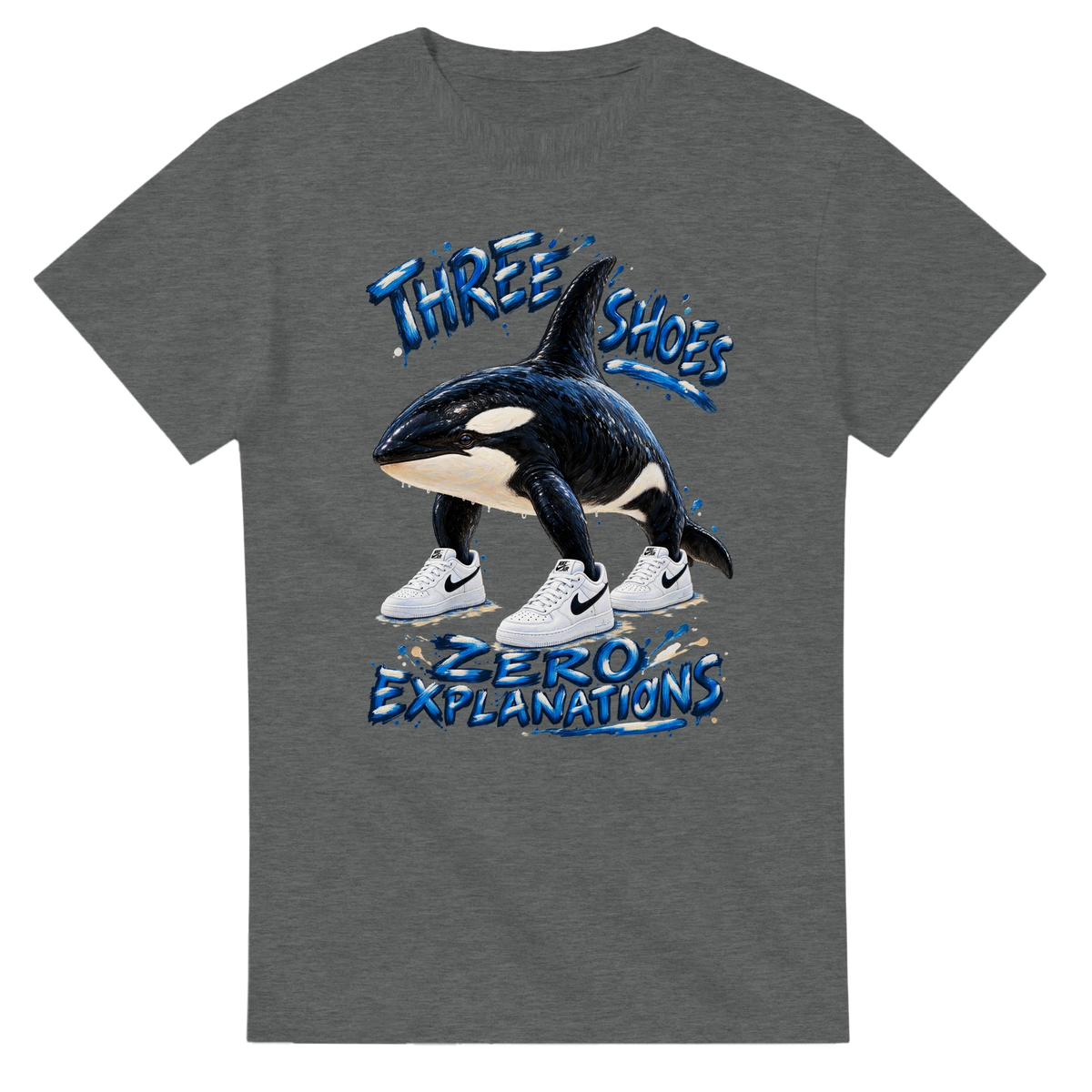 Graphite Heather t-shirt printed with Orcalero Orcala and the words Three shoes, zero explanations, front view