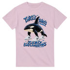 Light Pink t-shirt printed with Orcalero Orcala and the words Three shoes, zero explanations, front view
