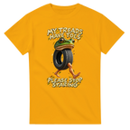 Gold t-shirt printed with Boneca Ambalabu and the words My treads have toes, please stop staring, front view