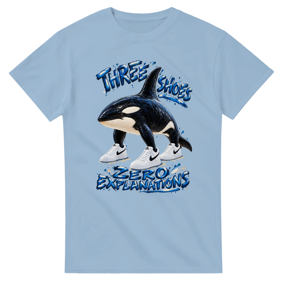 Light Blue t-shirt printed with Orcalero Orcala and the words Three shoes, zero explanations, front view