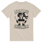 Sand t-shirt printed with Cappuccino Assassino and the words Your last coffee break, front view