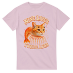Light Pink t-shirt printed with Trippi Troppi and the words Nine lives, twelve legs, front view