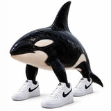 Orcalero Orcala, the brainrot orca standing on three legs in white trainers